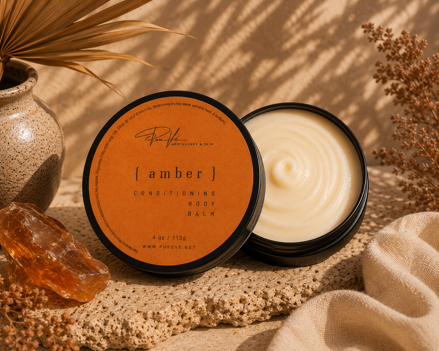 PureVe Amber Conditioning Body Butter in a 4 oz jar made with mango butter, sweet almond oil, avocado oil, and vitamin E for long-lasting hydration with a warm amber fragrance.