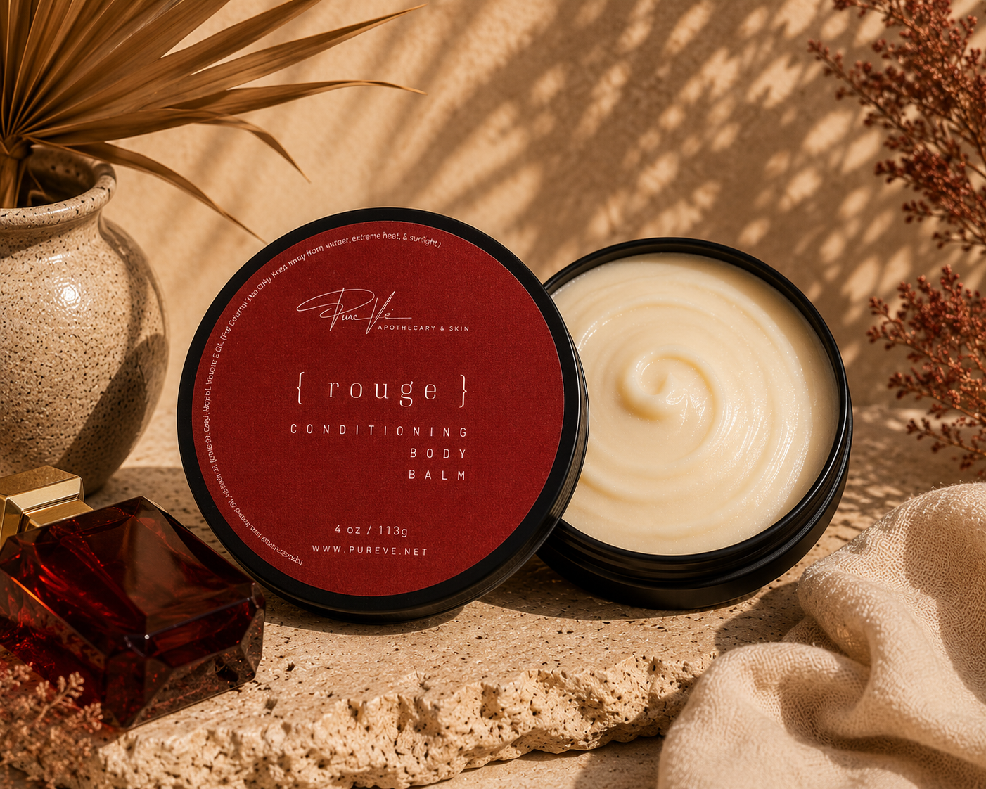 PureVe Rouge Conditioning Body Butter in a 4 oz jar made with mango butter, sweet almond oil, avocado oil, and vitamin E to moisturize dry skin with a luxurious warm fragrance.